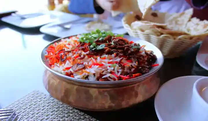 Awadhi biryani Lucknow rich close up — India culinary food tour TTI Tours