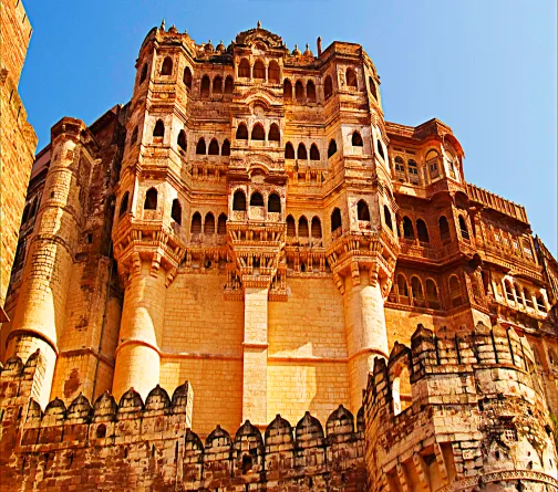 Mehrangarh Fort exterior in Jodhpur rising above the Blue City of Rajasthan, India