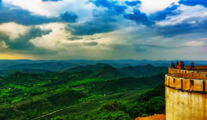 Rajasthan monsoon fort rains green hills — TTI Tours best time to visit